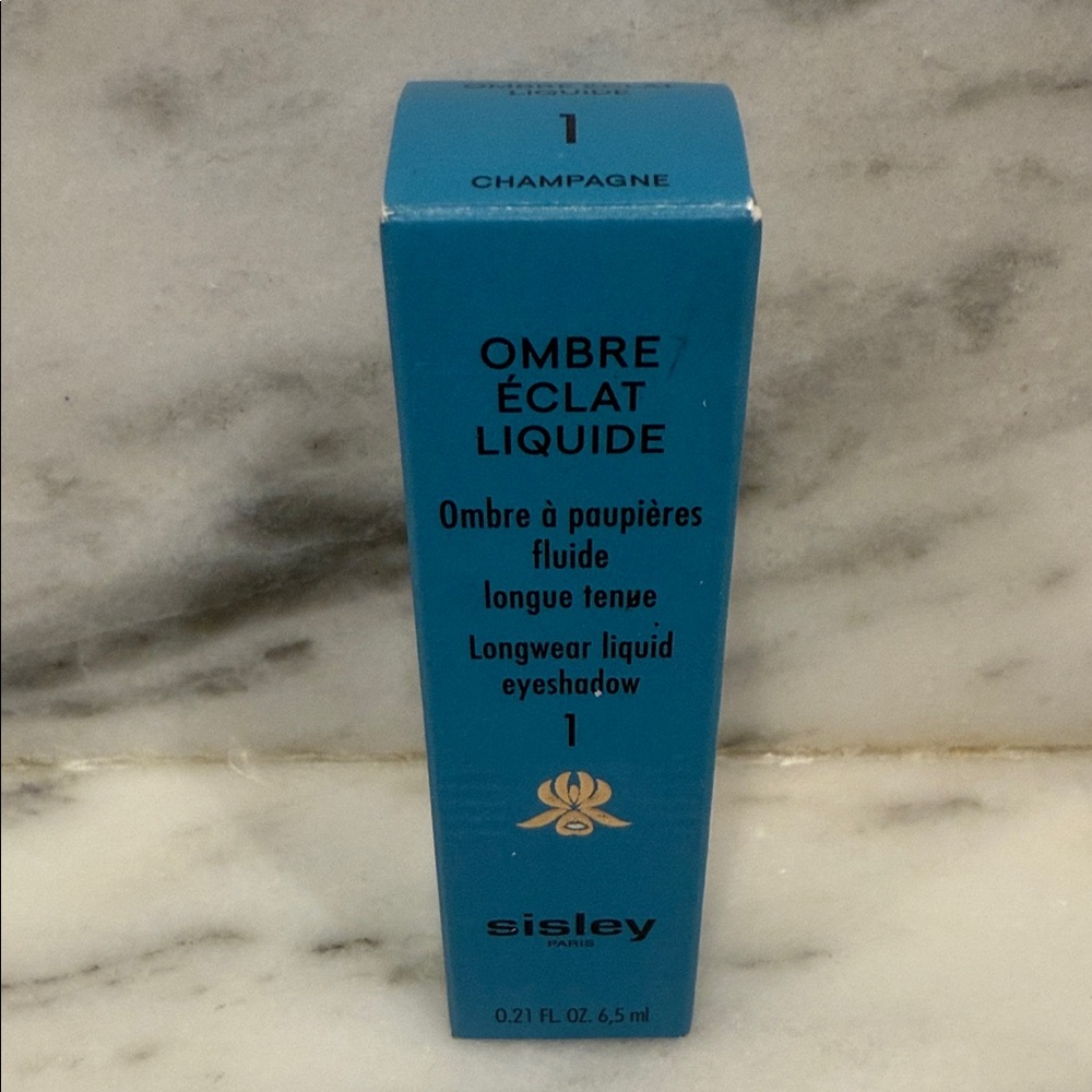 Sisley Ombre Éclat Liquide Eyeshadow in Champagne Blue Box